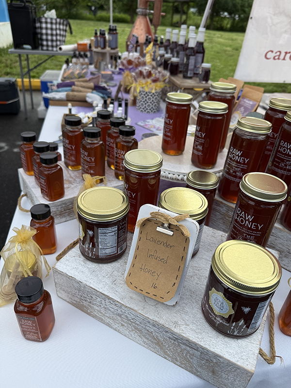 Jars of Honey Display at Market